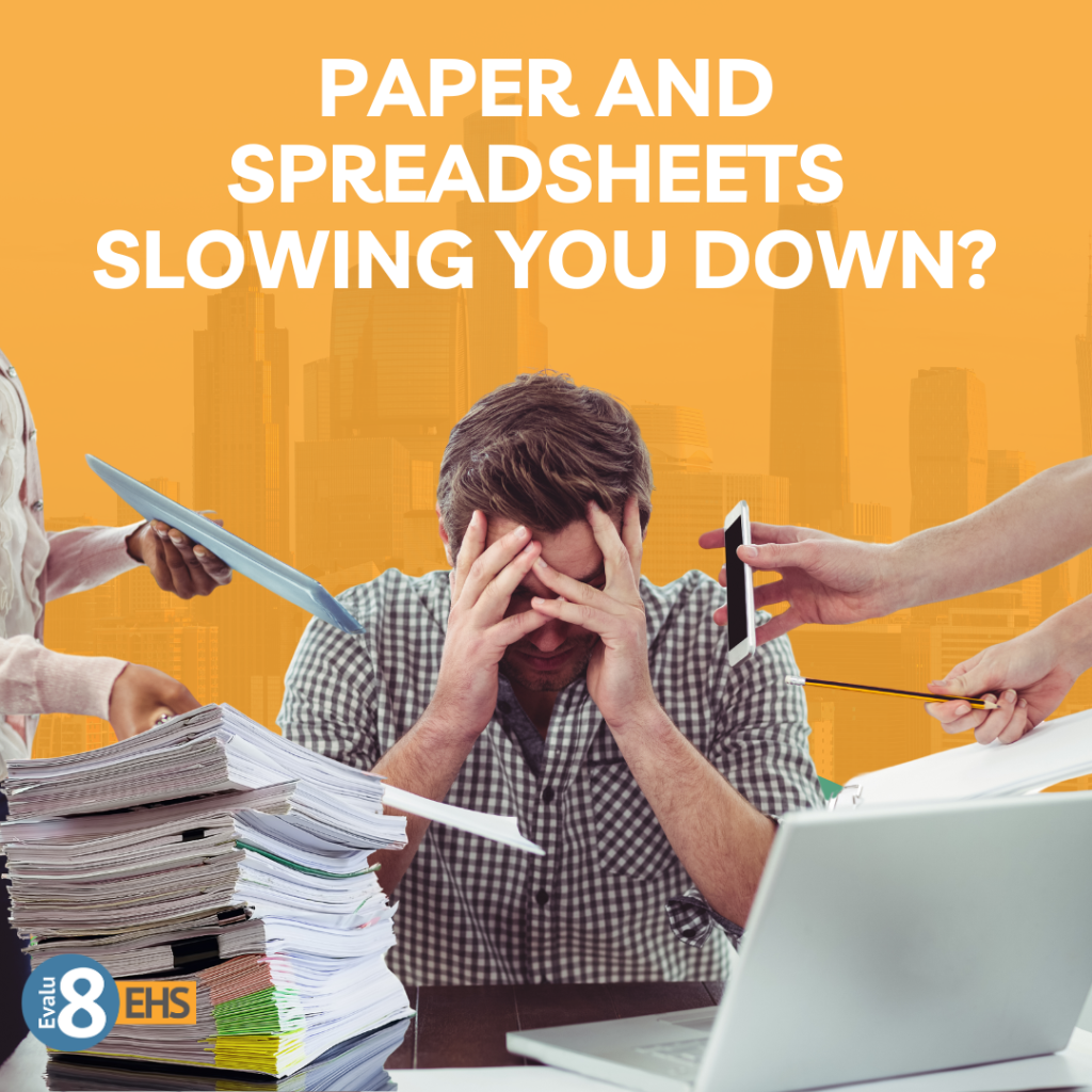 A manufacturer stressed at work because of having lots of paperwork and spreadsheets.